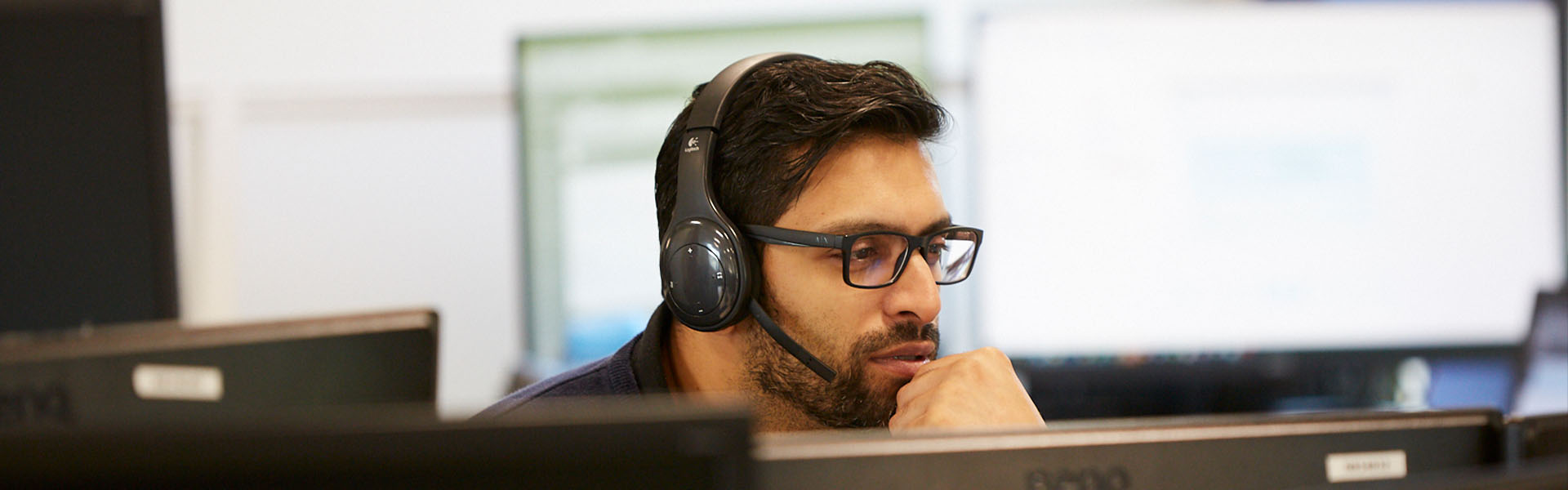 A Sunbelt employee speaking via a headset