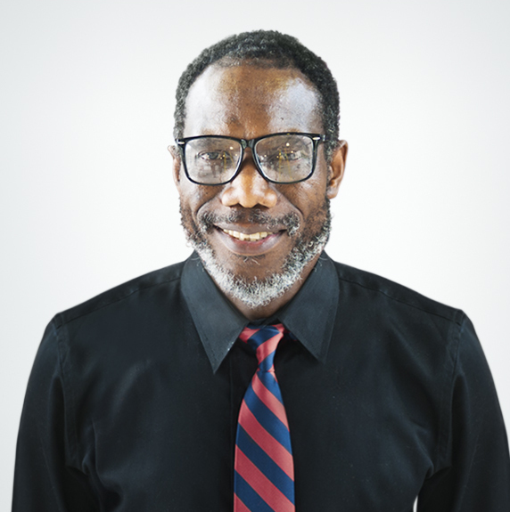 Man in shirt and tie smiling
